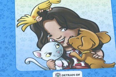 O Detran do Distrito Federal fez um livro infanto-juvenil  que explica a forma correta de transportar animais de estimação nos veículos.  -  (crédito: Reprodução TV Globo)