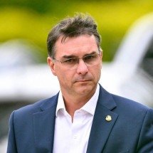 Flávio visita Bolsonaro e diz que pediu desculpas a Michelle após críticas - Evaristo Sa / AFP