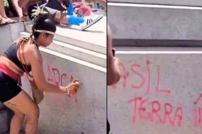 'Brasil Terra Indígena', escreveu a mulher na base de monumento, na Praça da Estação: detida e solta no domingo, ela passou ontem por audiência  no Juizado Especial Criminal -  (crédito: Redes sociais/Reprodução)