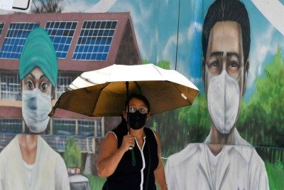 De acordo com a pesquisa, em eventos extremos, como a pandemia de COVID-19, as pessoas tendem a ouvir músicas positivas, que contribuam para a regulação do humor -  (crédito: Orlando SIERRA / AFP)