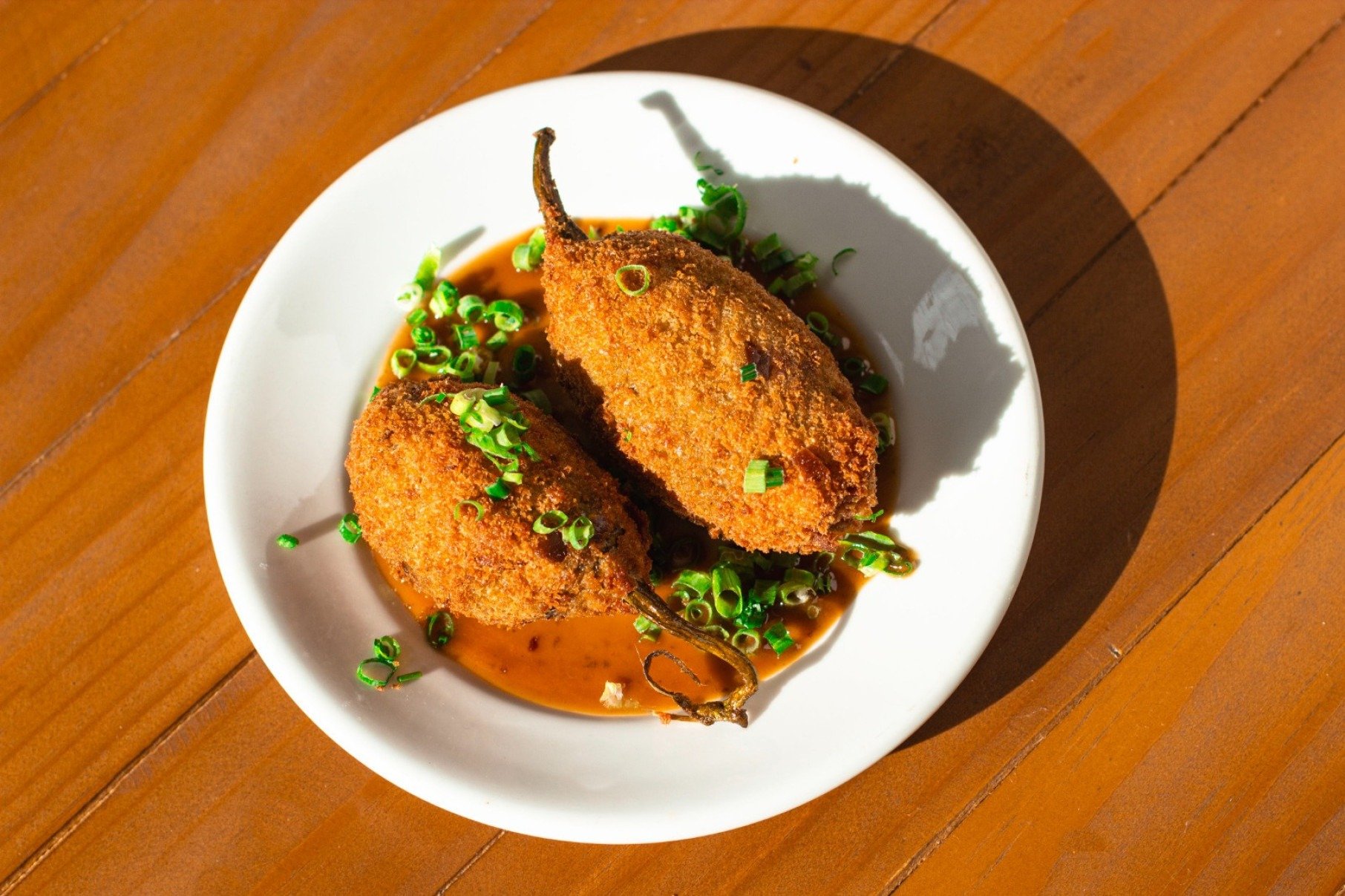 Jil&oacute; recheado com joelho de porco e frito &eacute; um dos petiscos de maior sucesso da Porca Voadora 