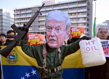 Protesto em Seoul contra a ação de Trump na captura do presidente venezuelano Nicolás Maduro -  (crédito: Jung Yeon-je / AFP)
