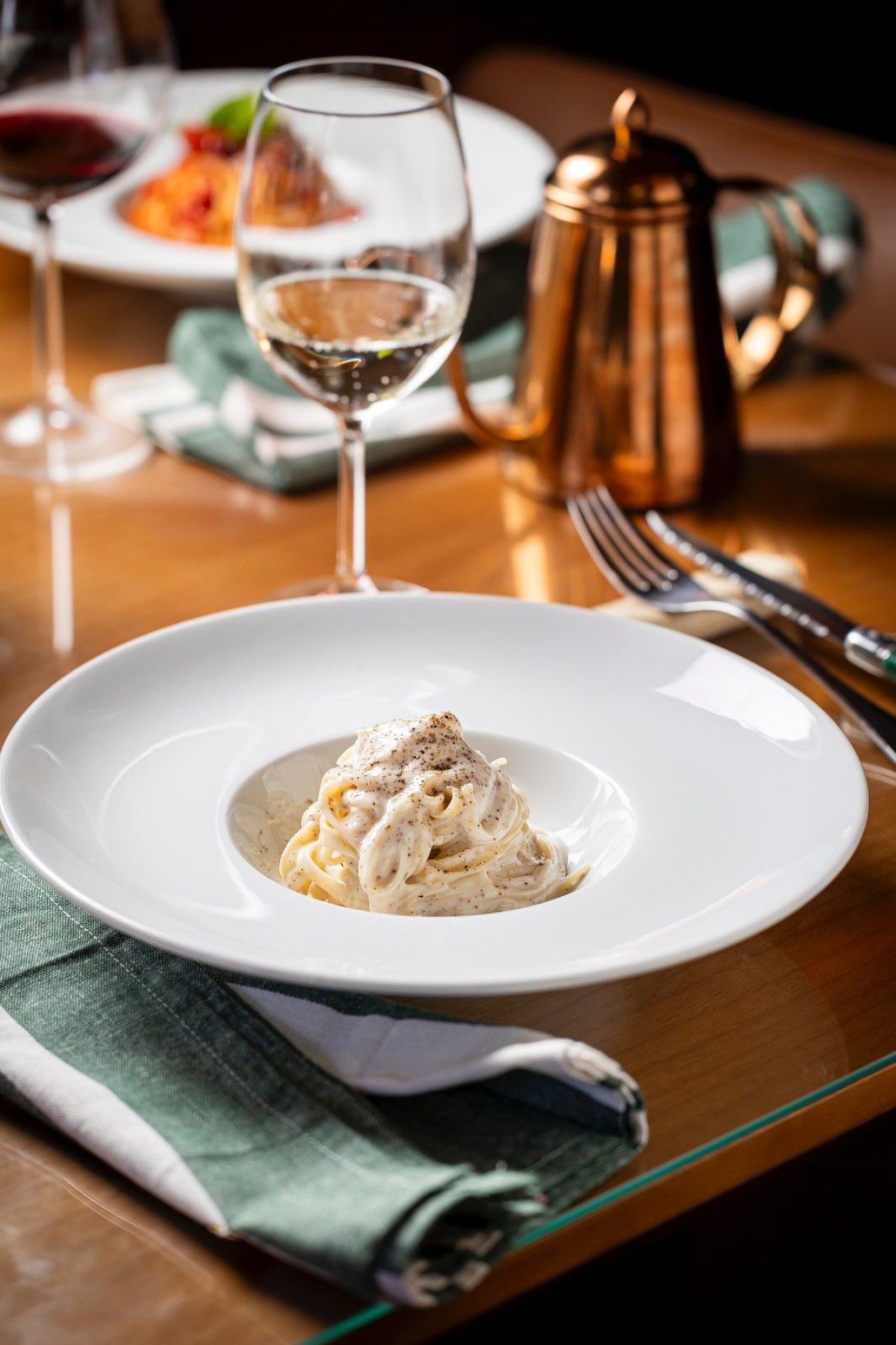 A fonduta de requeij&atilde;o de raspa do Righi Gastronomia vai muito bem com massas