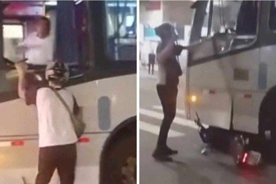 Confusão no trânsito terminou com ônibus arrastando moto -  (crédito: Redes sociais / reprodução)
