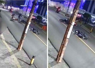 Câmeras de segurança registraram a abordagem e a luta corporal entre assaltantes e vítimas -  (crédito: Reprodução)