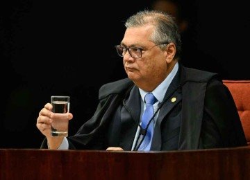 Flávio Dino faz um dueto com o presidente do STF, Edson Fachin, que tenta aprovar um Código de Ética para a magistratura e ampliar a transparência institucional -  (crédito: Evaristo Sá/AFP)