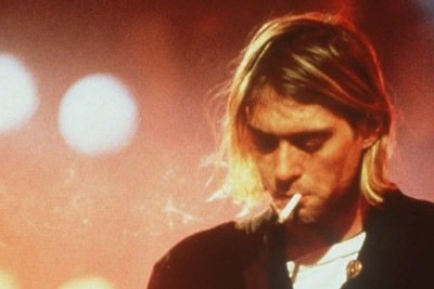 Kurt Cobain, l&iacute;der do Nirvana, teve a causa de sua morte revisitada em novo relat&oacute;rio, reabrindo o debate sobre o caso. -  (crédito: Reprodu&ccedil;&atilde;o)