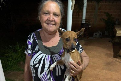 Irm&atilde; da idosa que caiu na cisterna e o cachorro da v&iacute;tima  -  (crédito: Reprodu&ccedil;&atilde;o CBMMG )