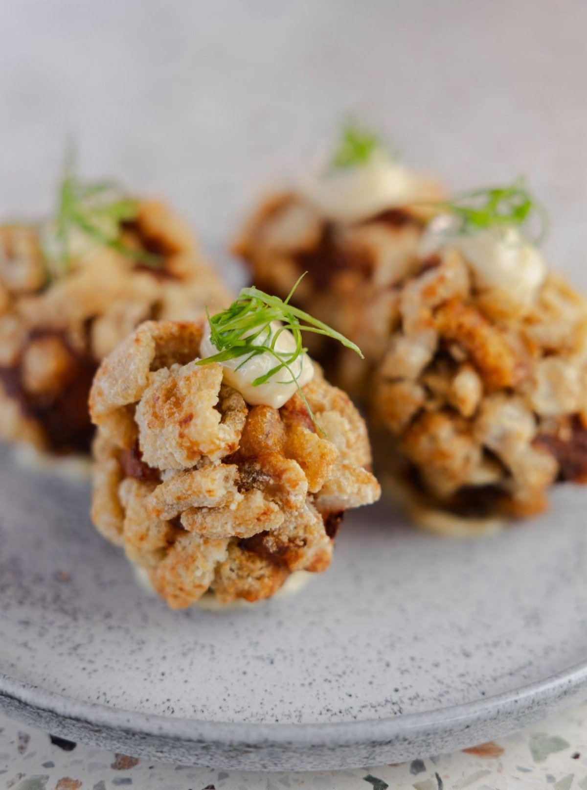 Torresmo &eacute; o que envolve as croquetas do TOM