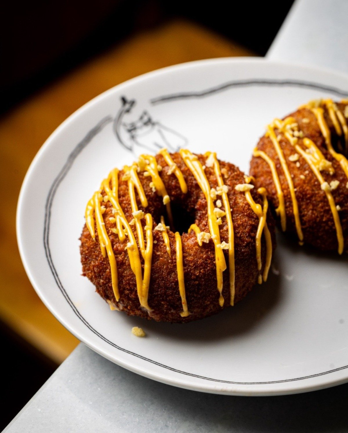 No Gata Gorda, os croquetes s&atilde;o de pato