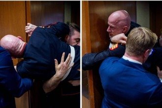 Brian McGinnis sendo retirado à força por Tim Sheehy e agentes da Polícia do Capitólio -  (crédito: AFP)