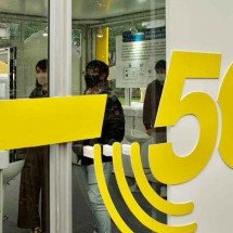 "Ferimentos" longe do front e fragilidade a ciberataques - Sam Yeh/AFP – 9/12/22