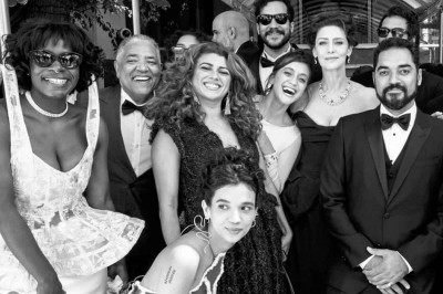 Carlos Francisco (à esquerda) com a equipe de 'O agente secreto' no Dolby Theatre
 -  (crédito: Carol Gherardi/Vitrine Filmes)