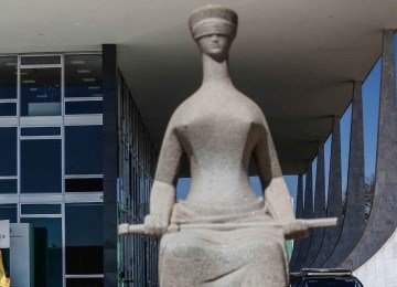 Estátua da Justiça vista em frente ao edifício do Supremo Tribunal Federal (STF) -  (crédito: Gabriela Biló/Folhapress)
