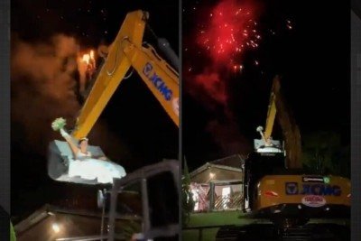 Vídeo: noiva surpreende convidados ao entrar em casamento em escavadeira e viraliza -  (crédito: Tupi)