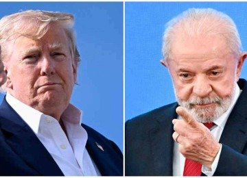  Donaldo Trump e Luiz Inácio Lula da Sival voltaram a mostrar entrosamento em reunião na Casa Branca -  (crédito:  Brendan Smialowski e  Evaristo Sa/AFP)