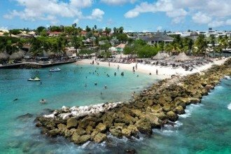 País que jogará a Copa é conhecido pelas praias de águas cristalinas e licor feito de laranjas