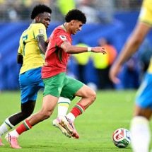 Um time sem  corpo e alma; um bando em campo - Jewel SAMAD / AFP