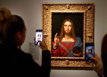 'Salvator Mundi', obra atribuída a Leonardo da Vinci, foi vendida por US$ 450 milhões em leilão da Christie's, em 2017
 -  (crédito: François Guillot/AFP)