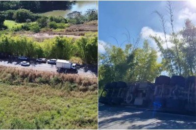 Imagens registradas pela Rádio 94 FM de Nanuque mostram caminhão tombado à margem da rodovia após acidente -  (crédito: Pedro Hugo / @radio94fmnanuque / Reprodução)