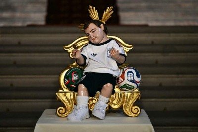 Imagem de Menino Jesus ganhou uniforme da seleção mexicana -  (crédito: Yuri Cortez/AFP)
