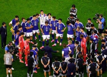 A determinação e disciplina são características marcantes da Seleção do Japão, adversária do Brasil na próxima segunda-feira (29) -  (crédito: Lars Baron/AFP)