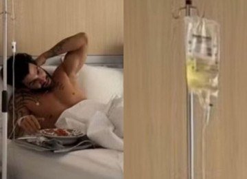 Gusttavo Lima choca fãs ao aparecer acamado com soro assistindo ao jogo da Copa -  (crédito: Tupi)