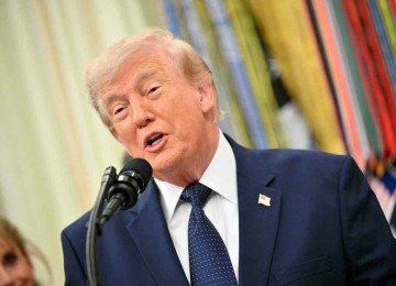 Donald Trump interferiu pedindo a suspensão do cartão vermelho de jogador dos EUA -  (crédito: Mandel Ngan/AFP)