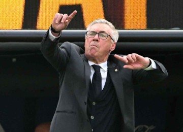 Carlo Ancelotti optou por não voltar ao Brasil após a eliminação do time canarinho da Copa do Mundo -  (crédito: Pedro UGARTE / AFP)