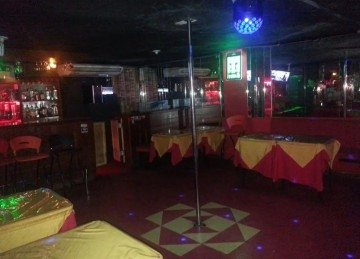 A vítima relatou que trabalha na boate de strip-tease, Enigma Scotch Bar -  (crédito: Facebook Enigma Scotch Bar/Reprodução)