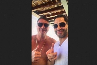 Foto divulgada nesta quarta-feira (15/7) mostra Fl&aacute;vio Bolsonaro e o Sic&aacute;rio de Daniel Vorcaro -  (crédito: Reprodu&ccedil;&atilde;o - ICL Not&iacute;cias)