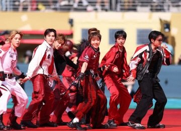 O Brasil é historicamente um dos países que mais consome a música do BTS -  (crédito: Carl Recine / Getty Images / AF)