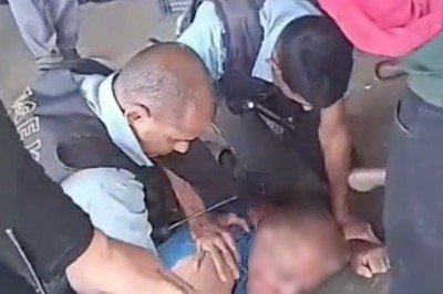 Comerciante irregular agredido por seguranças locais -  (crédito: Reprodução/Redes Sociais)