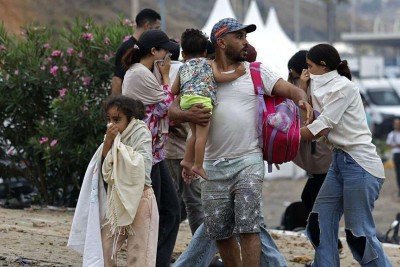 Dezenas de milhares de migrantes cruzaram a fronteira do Marrocos em direção ao enclave espanhol de Ceuta, no norte da África, na noite de 31 de julho -  (crédito: Getty Images)