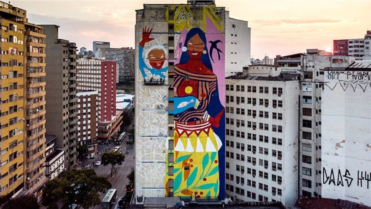 Mural em empena de pr&eacute;dio transforma a paisagem urbana, evidenciando as obras monumentais do Circuito Urbano de Arte (CURA) em Belo Horizonte -  (crédito: Reprodu&ccedil;&atilde;o / CURA)