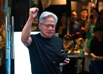 O CEO Nvidia, Jensen Huang, em estilo casual, de camiseta preta
 -  (crédito: Jung Yeon-je / AFP)