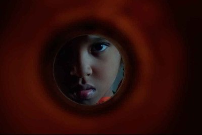 Tutu (Efraim Santos), caçula da família retratada no longa, é o personagem que enxerga as circunstâncias de forma mais lúcida -  (crédito: Vitrine Filmes/Divulgação)