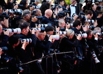 Agora, a fama chega de uma vez, como um flash, e o resto da vida é gerenciar lampejos de celebridade -  (crédito: Valery HACHE / AFP)