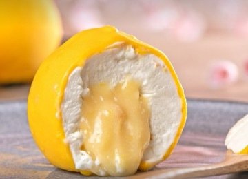 Na confeitaria de Cesar Yukio, a Hanami, o convite é para apreciar a vitrine antes de comer. O mais famoso é O Yuzu, que tem o formato e a cor amarela do cítrico asiático, que fica entre o limão siciliano e a mexerica -  (crédito: Hanami/Divulgação)