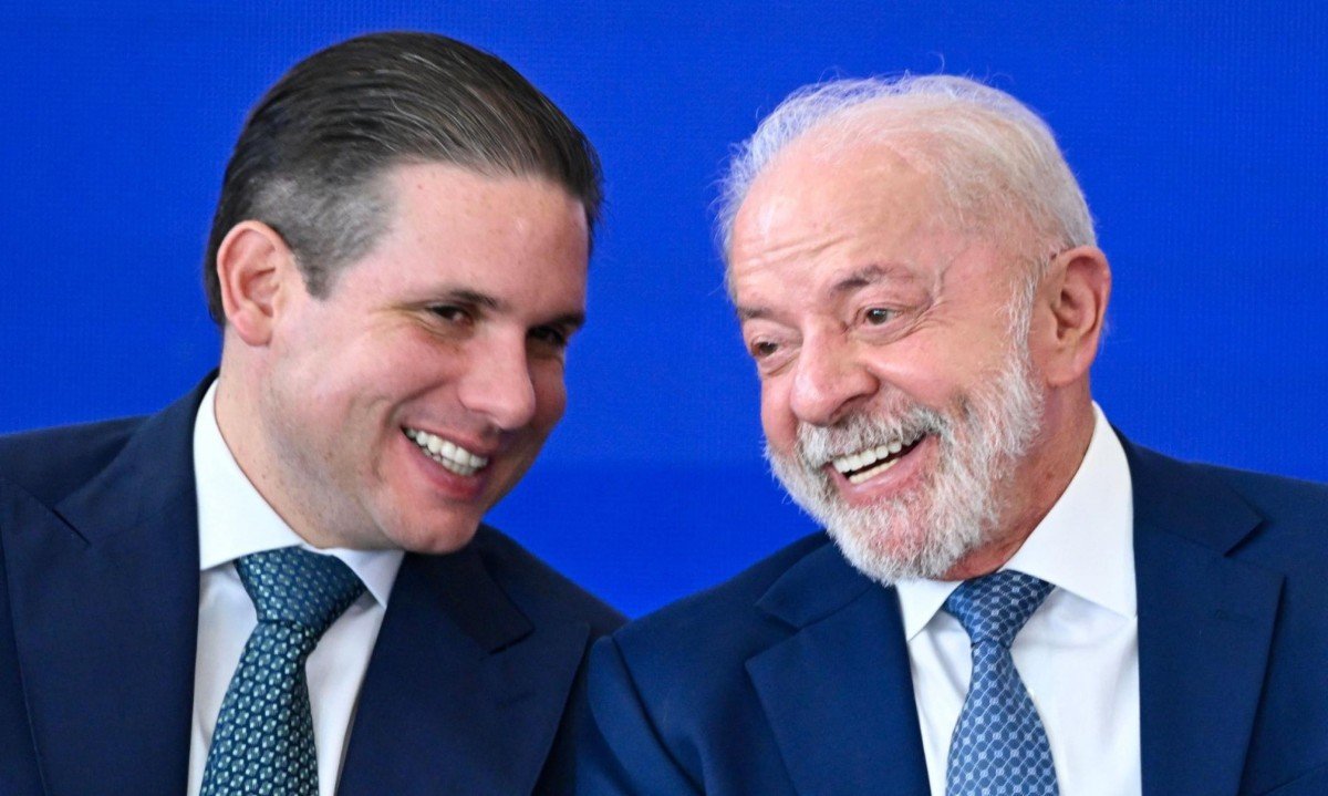 Presidente da câmara apareceu com boné e bandeiras do presidente durante ato - (crédito: Evaristo Sá/AFP)