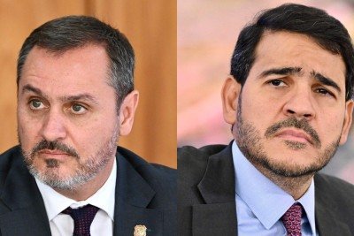 Andrei Rodrigues (esquerda) e Jorge Messias (direita) bateram boca no gabinete de Lula -  (crédito: Evaristo Sá/AFP)