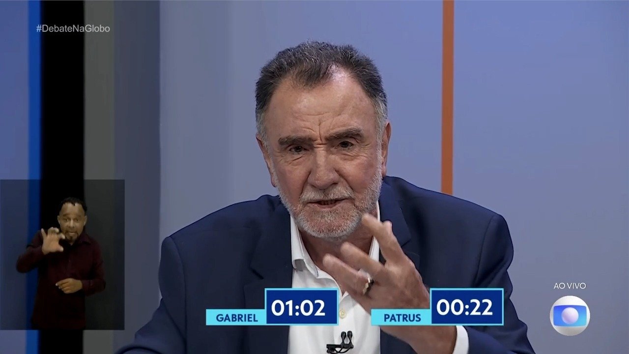 Patrus Ananias nega que projeto da Escola Plural fa&ccedil;a parte de suas propostas durante debate na TV Globo -  (crédito: Reprodu&ccedil;&atilde;o/TV Globo)