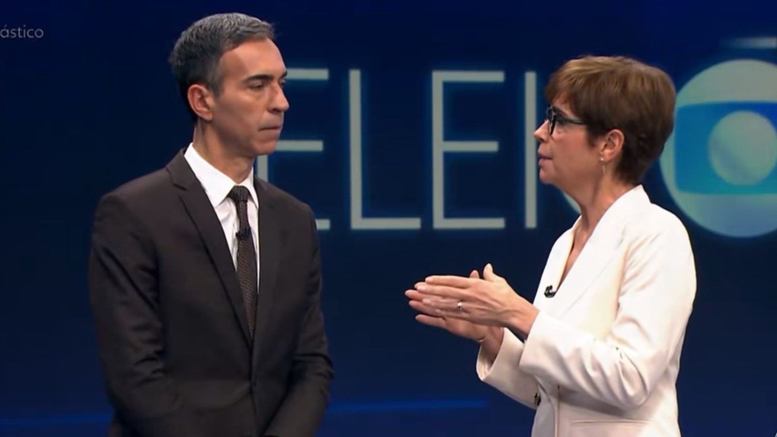 Renata Lo Prete e Cesar Tralli discutem no est&uacute;dio da Globo a incoer&ecirc;ncia de Fl&aacute;vio Bolsonaro sobre o resultado das urnas -  (crédito: TV Globo / reprodu&ccedil;&atilde;o)