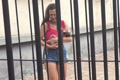 Vitória Freitas e o noivo ouviam um som fraco enquanto seguiam para o mercado quando decidiram investigar a origem do barulho, pensando ser o miado de um gato. Era uma bebê -  (crédito: Reprodução/Tupi)