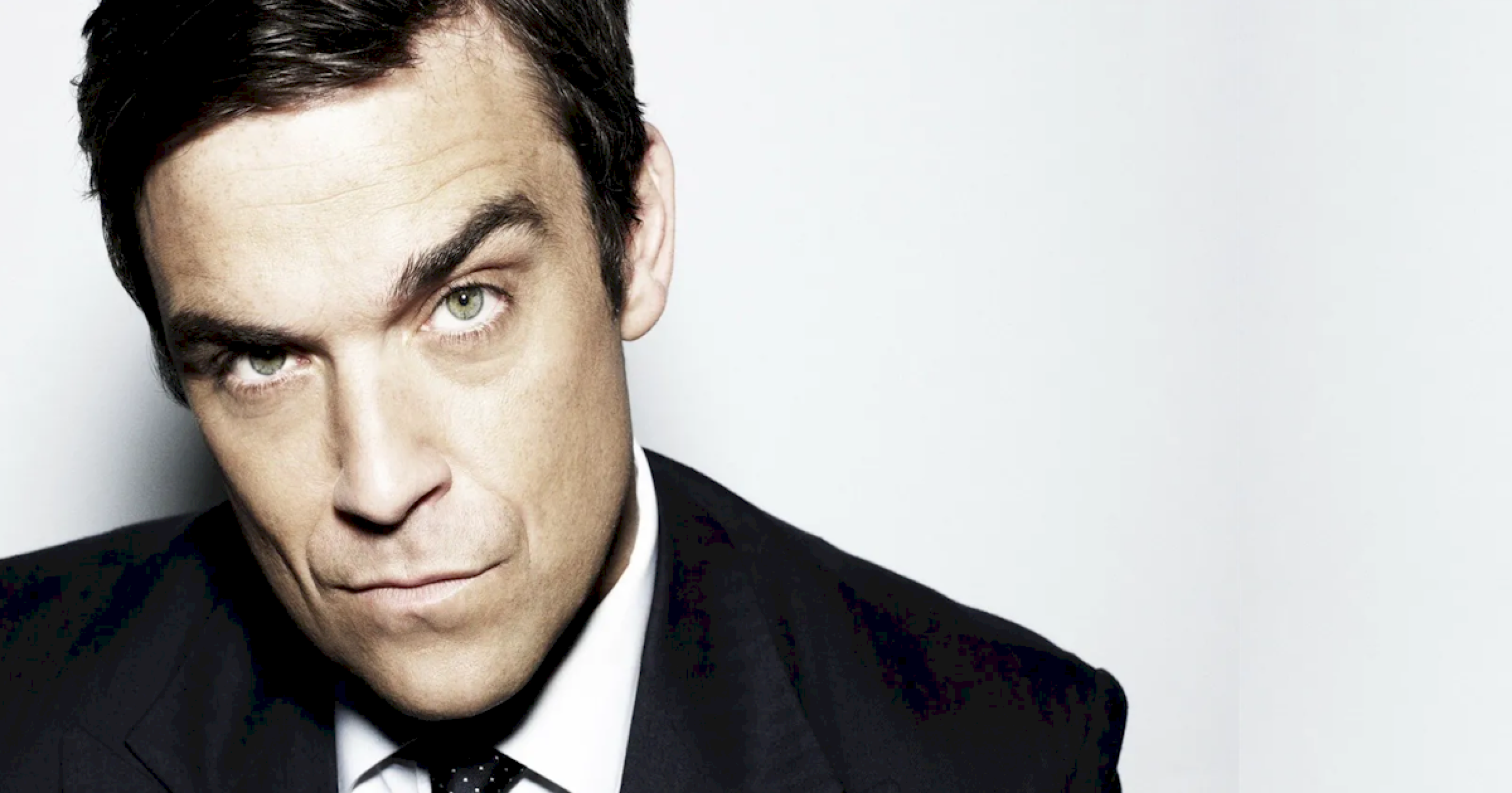 Robbie Williams iguala os Beatles em álbuns Nº 1 no Reino Unido Robbie Williams iguala os Beatles em álbuns Nº 1 no Reino Unido