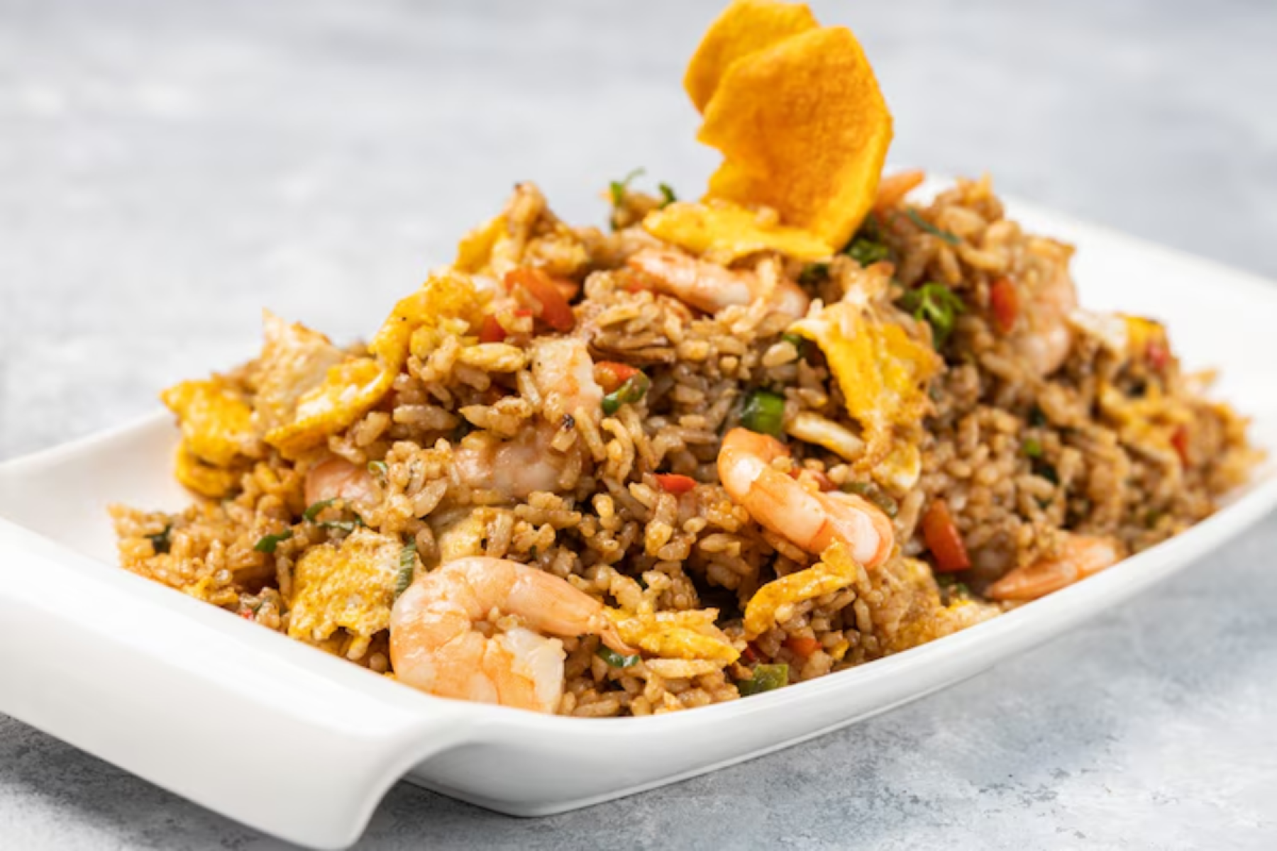 Arroz Chaufa (Peru) - Resultado da influência chinesa no Peru, o arroz chaufa é um tipo de 