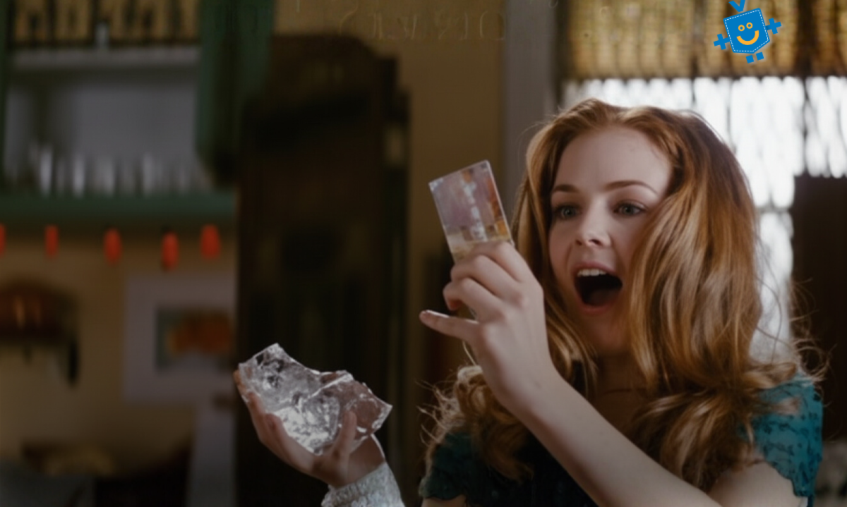 Cena do filme Os Delírios de Consumo de Becky Bloom em que a protagonista tira o cartão de crédito de dentro de uma pedra de gelo. 