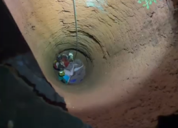 O cachorro da vítima passou a apresentar comportamento incomum, indo repetidamente até o local do poço desativado, como se tentasse chamar atenção -  (crédito: Corpo de Bombeiros/Reprodução)