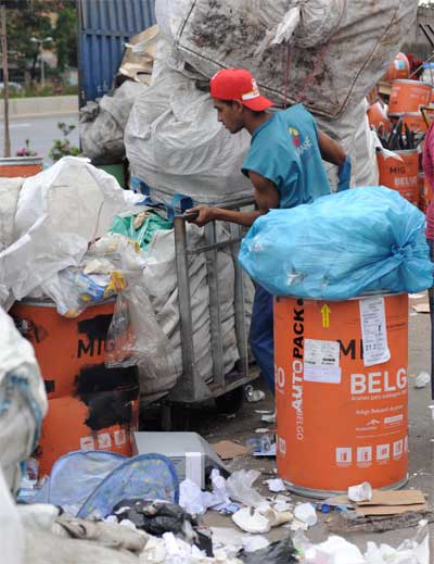 Catadores de papel querem votação de benefício diferenciado para Previdência - Leandro Couri/EM/D.A Press