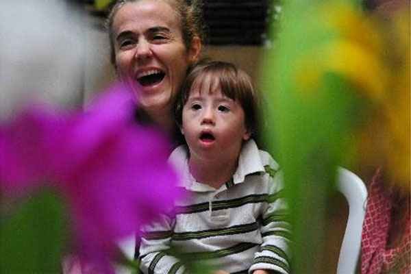Jovens com Down aprendem sobre orquídeas: plantas raras exigem cuidado especial - Alexandre Guzanshe/EM /D.A Press